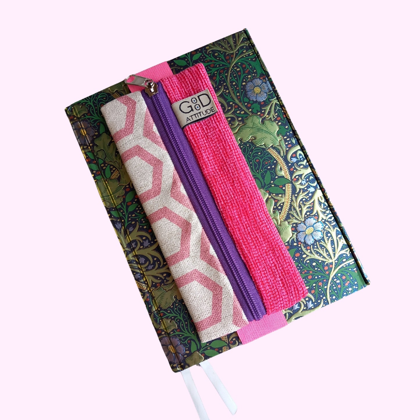 estuche pequeño para lapices con goma para sujetar a la tapa